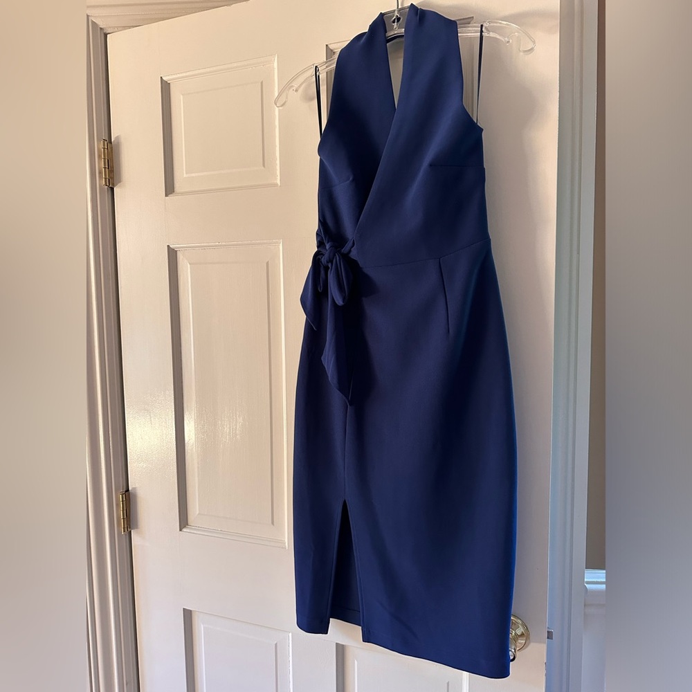 Never worn beautiful navy halter dress to below the knee.